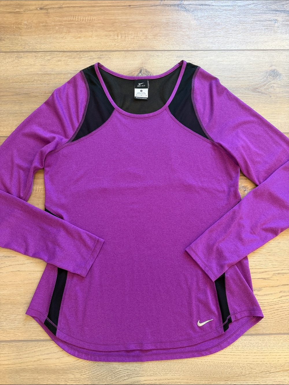 Nike Women's Purple Long-Sleeve Athletic Tee with Black Accents